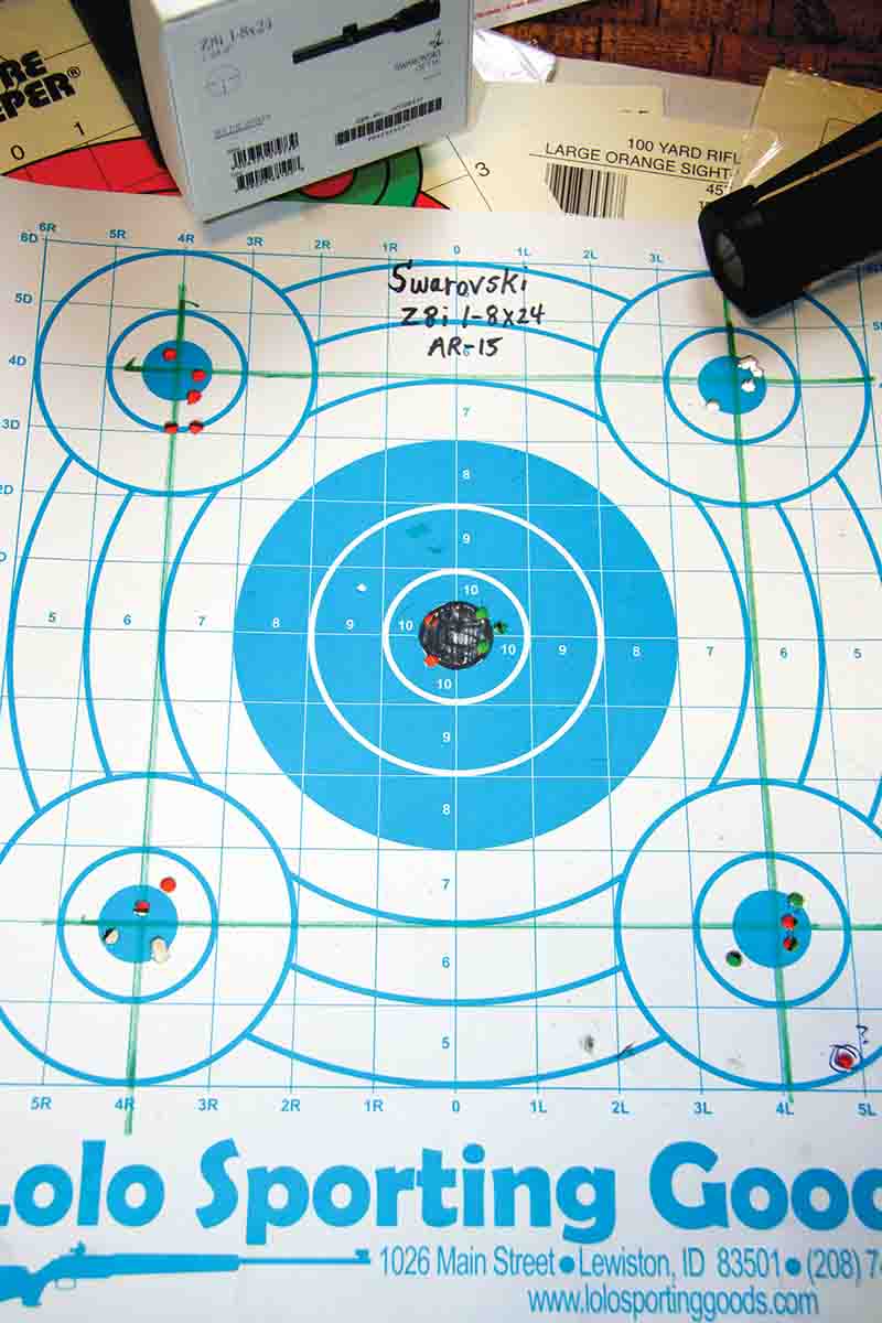 To test turret tracking, Patrick zeroed the rifle on the center bullseye at 100 yards, then adjusted 11 clicks up and left/right and down and left/right. The scope tracked precisely.